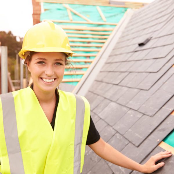 a Female roof construction worker.